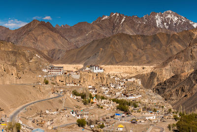 View of a building with mountain range in the background
