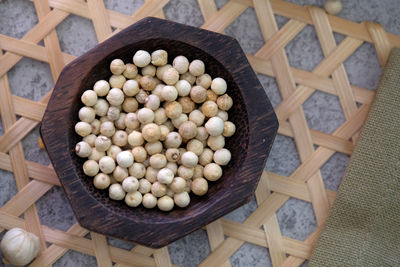 High angle view of eggs in container on table