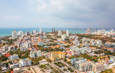 High angle view of buildings in city against sky