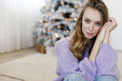 Portrait of young woman looking away