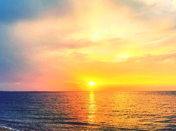 Scenic view of sea at sunset