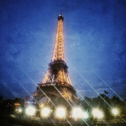 Low angle view of illuminated eiffel tower