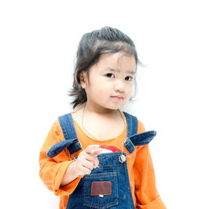 Portrait of cute baby against white background