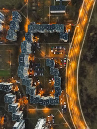 Aerial view of illuminated cityscape at night