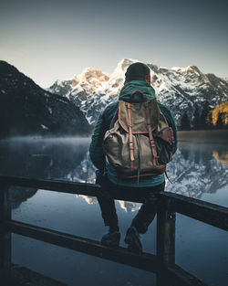 Man standing on snowcapped mountain