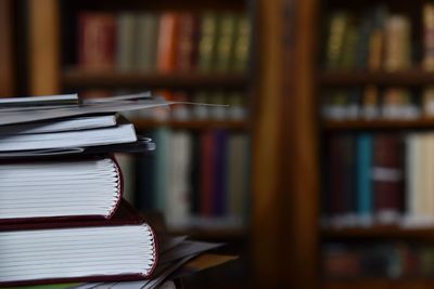 Close-up of books on table at home