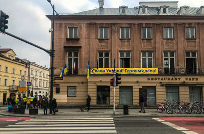 People walking on street of warsaw