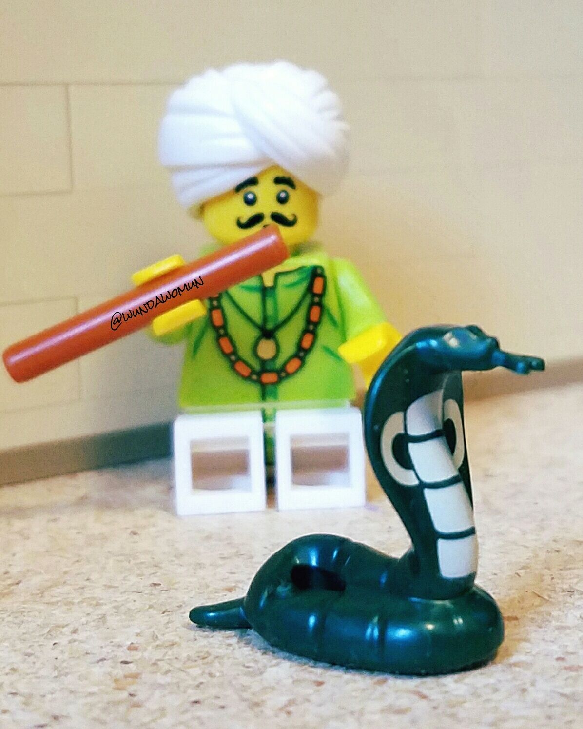 Lego snake charmer