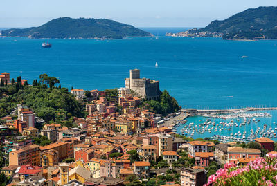 High angle view of city by sea