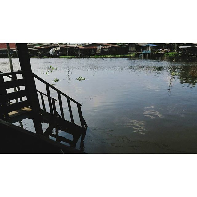 water, built structure, architecture, reflection, transfer print, waterfront, building exterior, auto post production filter, clear sky, lake, river, copy space, pier, outdoors, day, nature, no people, rippled, tranquility, bridge - man made structure