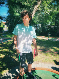 Full length of boy standing in a park 