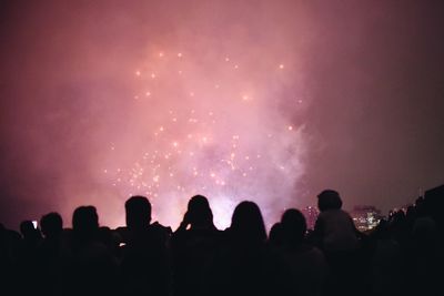 People enjoying at concert