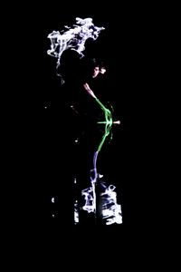 Light painting against black background