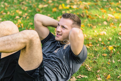 Young man looking away outdoors