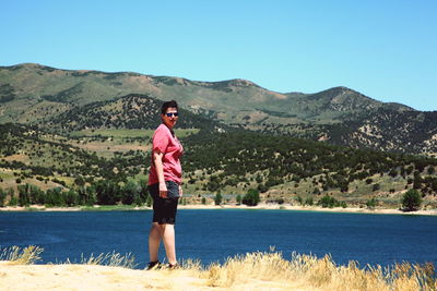 Woman standing on mountain landscape