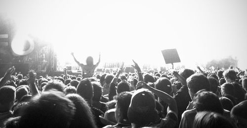 Rear view of people enjoying music concert