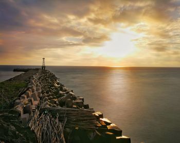 Scenic view of sea against sky during sunset