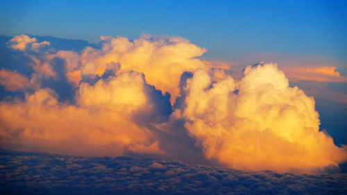 Low angle view of dramatic sky during sunset