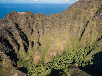 High angle view of rocks on mountain against sky