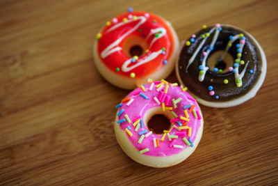 Close-up of multi colored candies on table