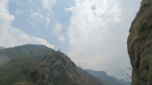 Low angle view of mountains against sky