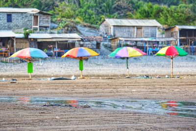 Multi colored umbrella on beach