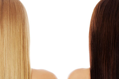 Rear view of woman against white background