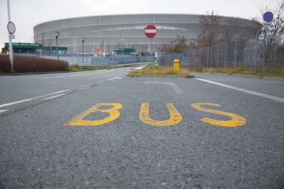 New yellow city bus marking on the road