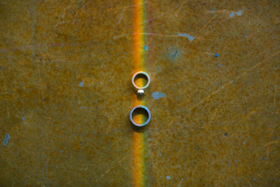 Directly above shot of rings on table