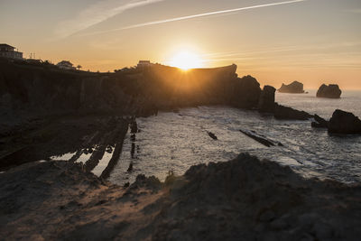 Scenic view of sea against sky during sunset