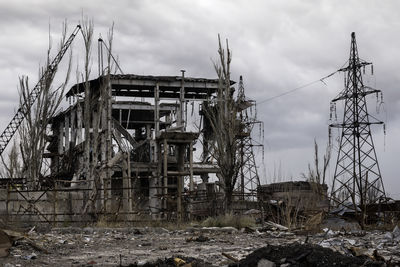 Abandoned building against sky