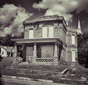 Built structure against cloudy sky