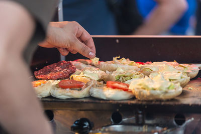 Midsection of person preparing food