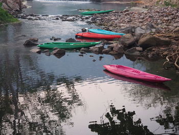 Boats moored in lake