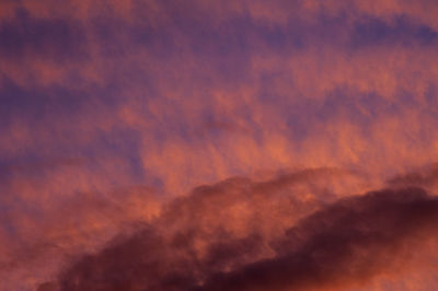 Low angle view of dramatic sky during sunset