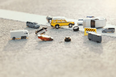 Close-up of toy car on road