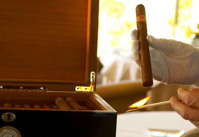 Close-up of man working on wood