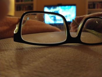 Close-up of sunglasses on table