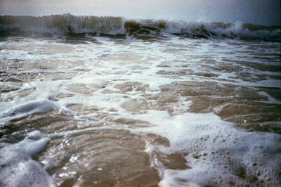 Waves splashing on rocks