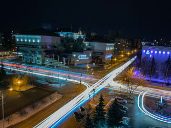 High angle view of illuminated city street at night