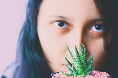 Close-up portrait of young woman