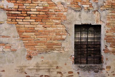 Close-up of window on brick wall