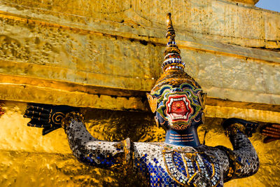 Giant statue in the grand palace in bangkok, thailand.