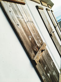 Low angle view of wooden wall