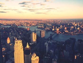 Aerial view of city during sunset