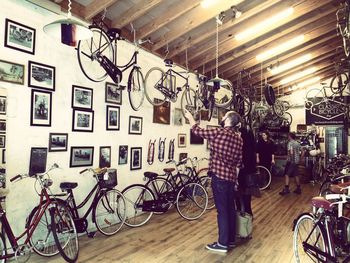 Bicycles parked in front of wall