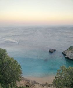 High angle view of calm sea at sunset