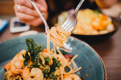 Close-up of hand holding food