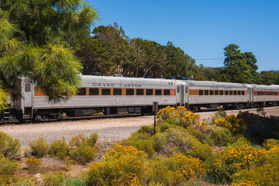 Train on railroad track against sky