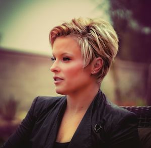 Portrait of smiling young woman looking away